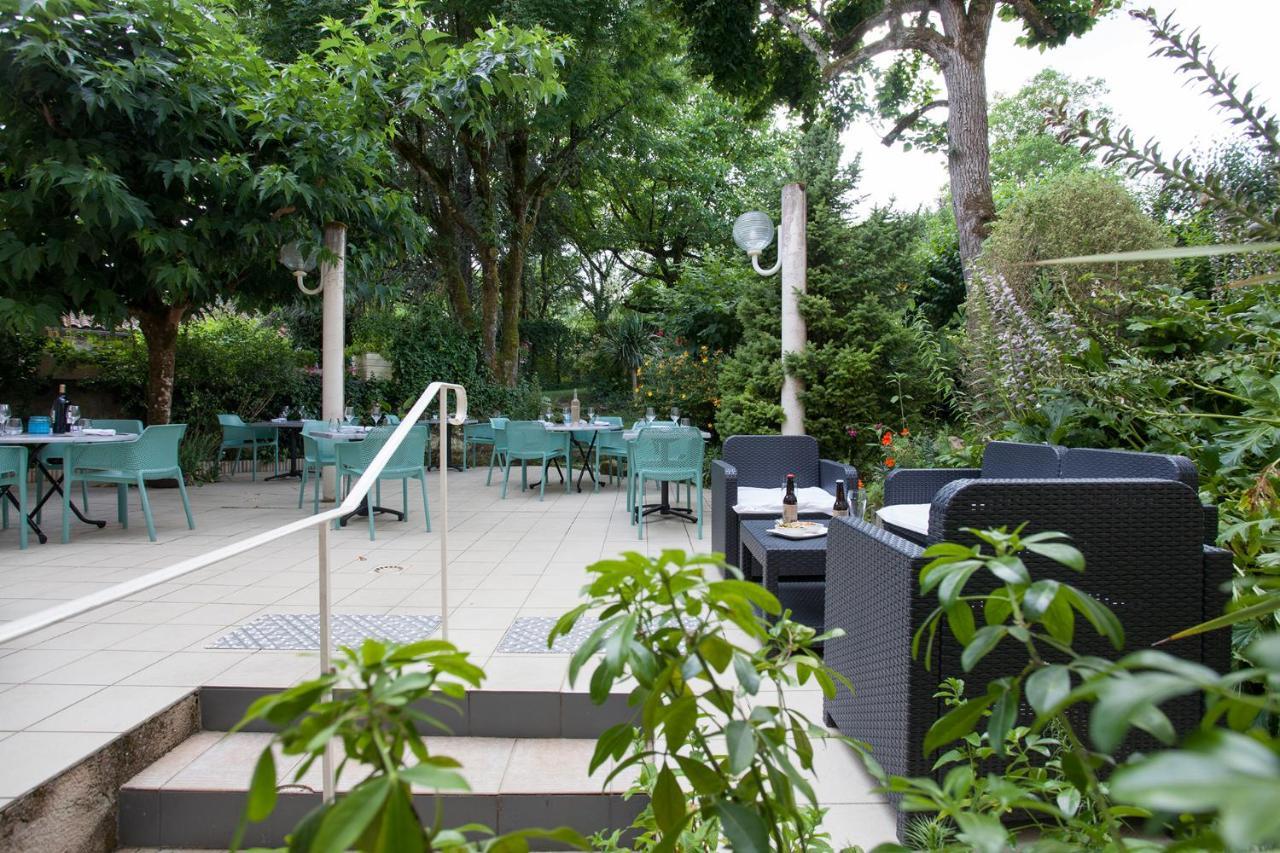 Hotel Le Lion d'Or à Manzac-sur-Vern Extérieur photo