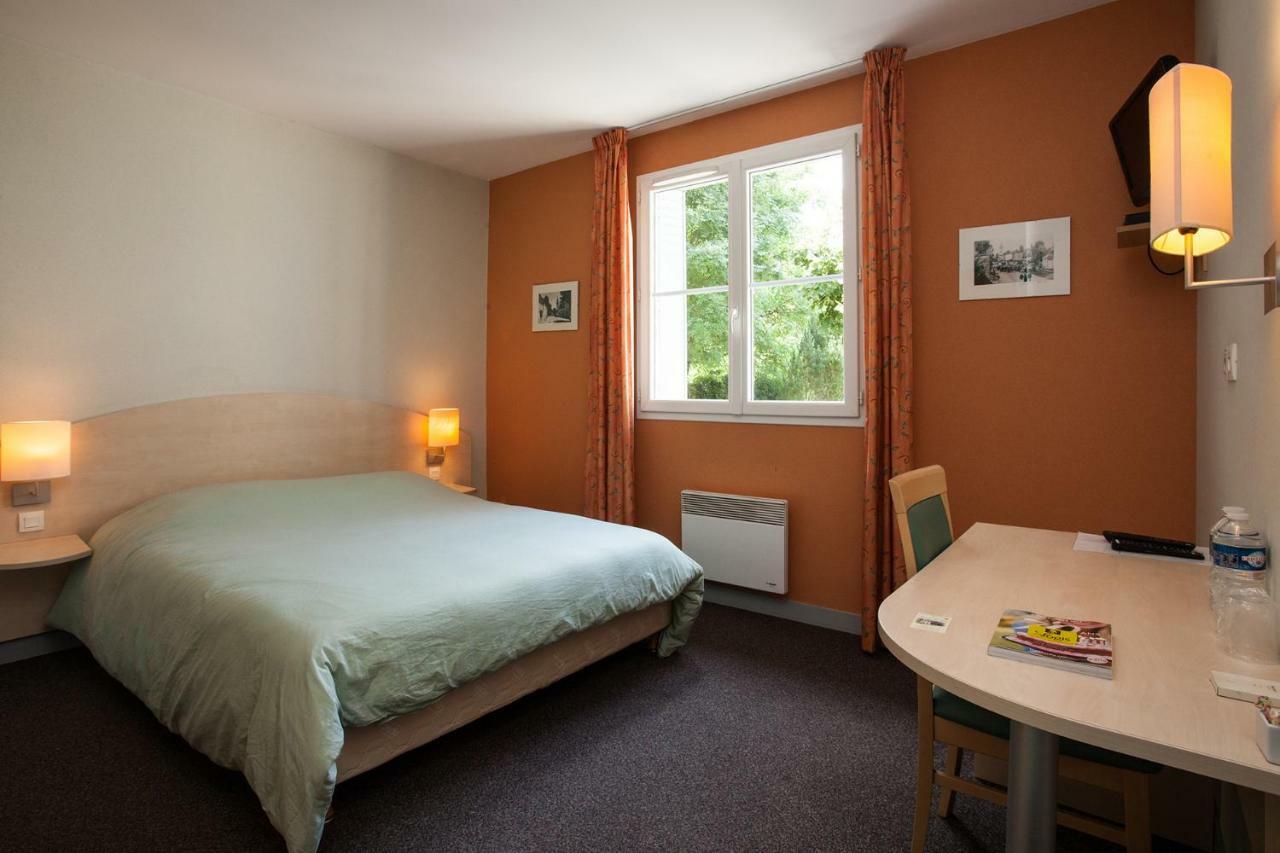 Hotel Le Lion d'Or à Manzac-sur-Vern Extérieur photo