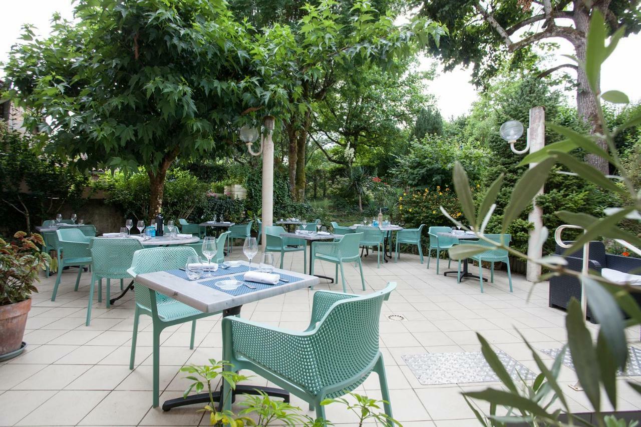 Hotel Le Lion d'Or à Manzac-sur-Vern Extérieur photo