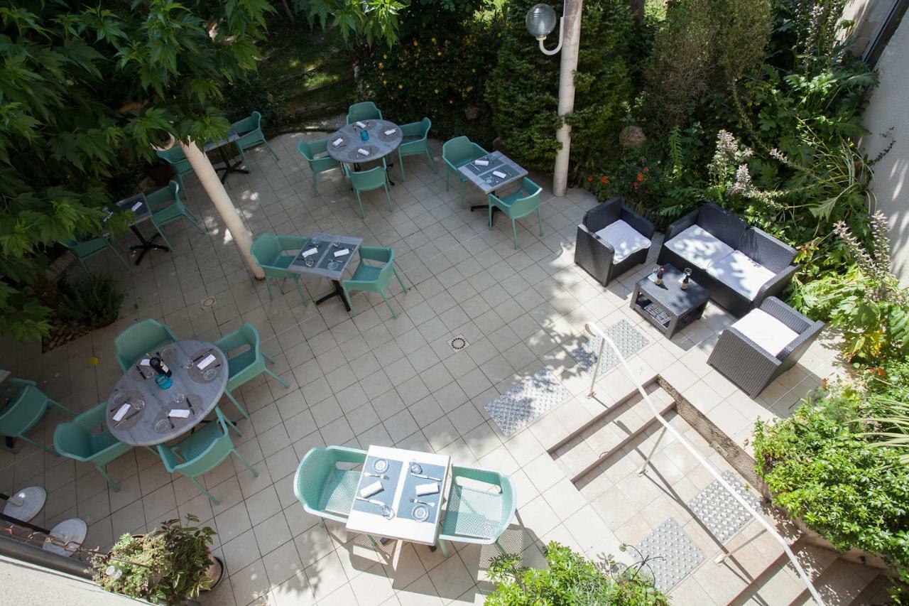 Hotel Le Lion d'Or à Manzac-sur-Vern Extérieur photo